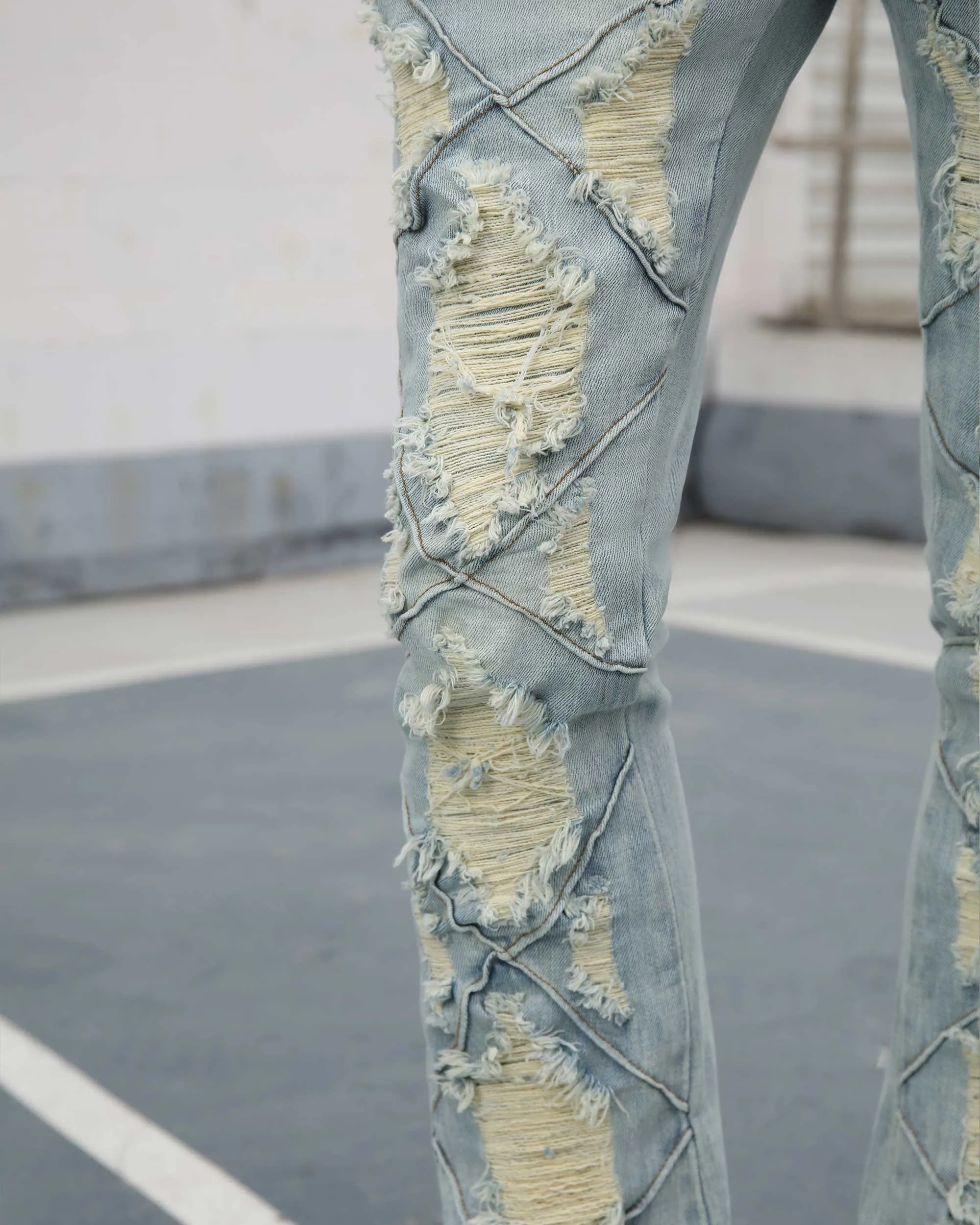 Distressed Flared Blue Jeans with Large Ripped