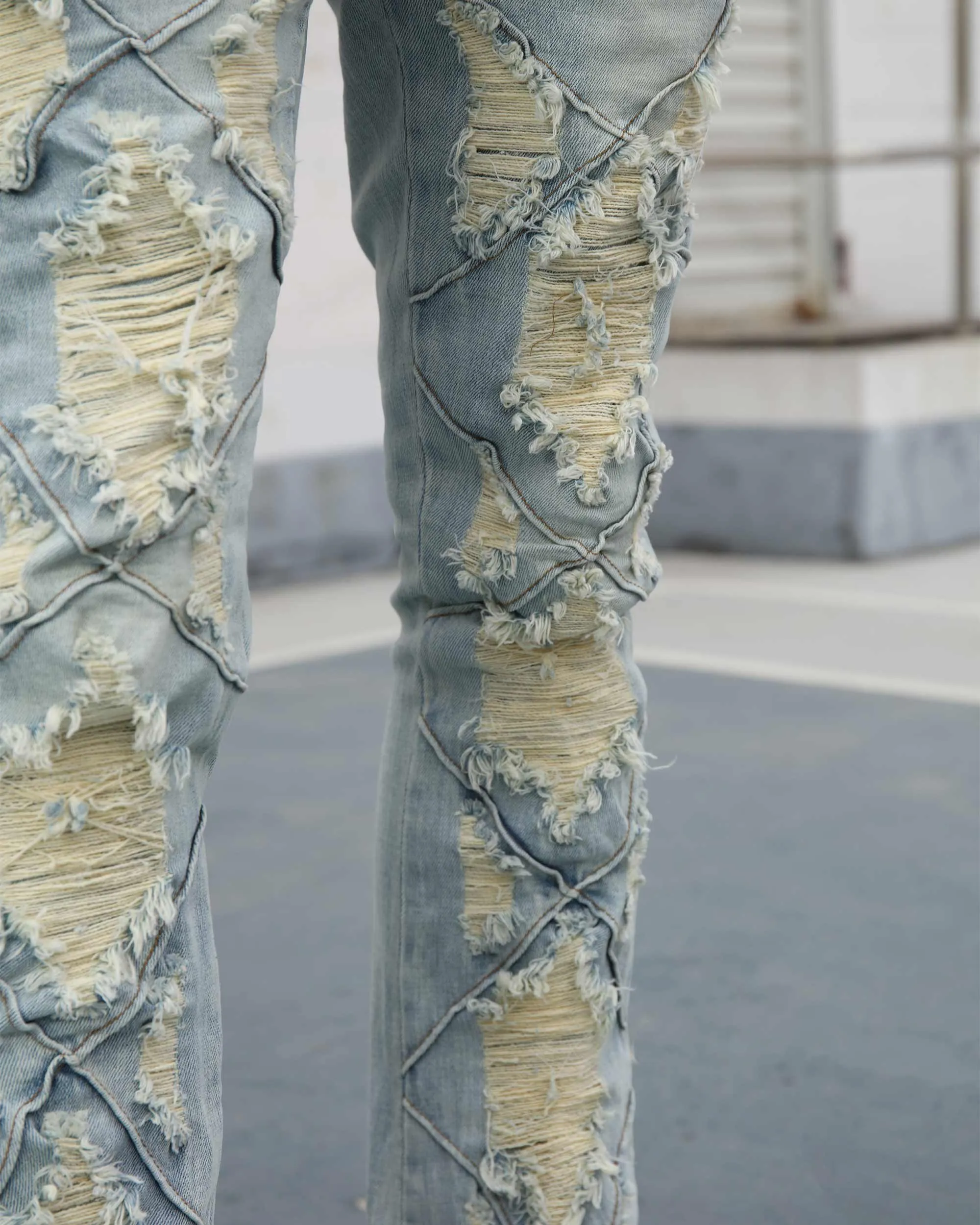 Distressed Flared Blue Jeans with Large Ripped