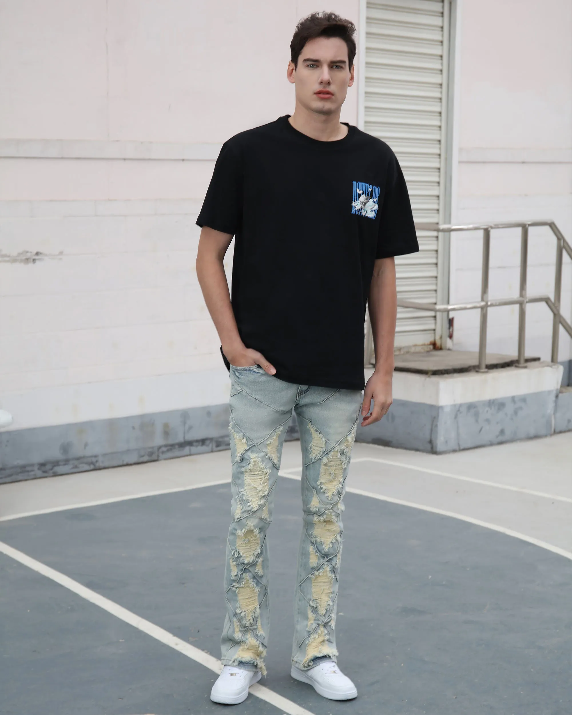 Distressed Flared Blue Jeans with Large Ripped