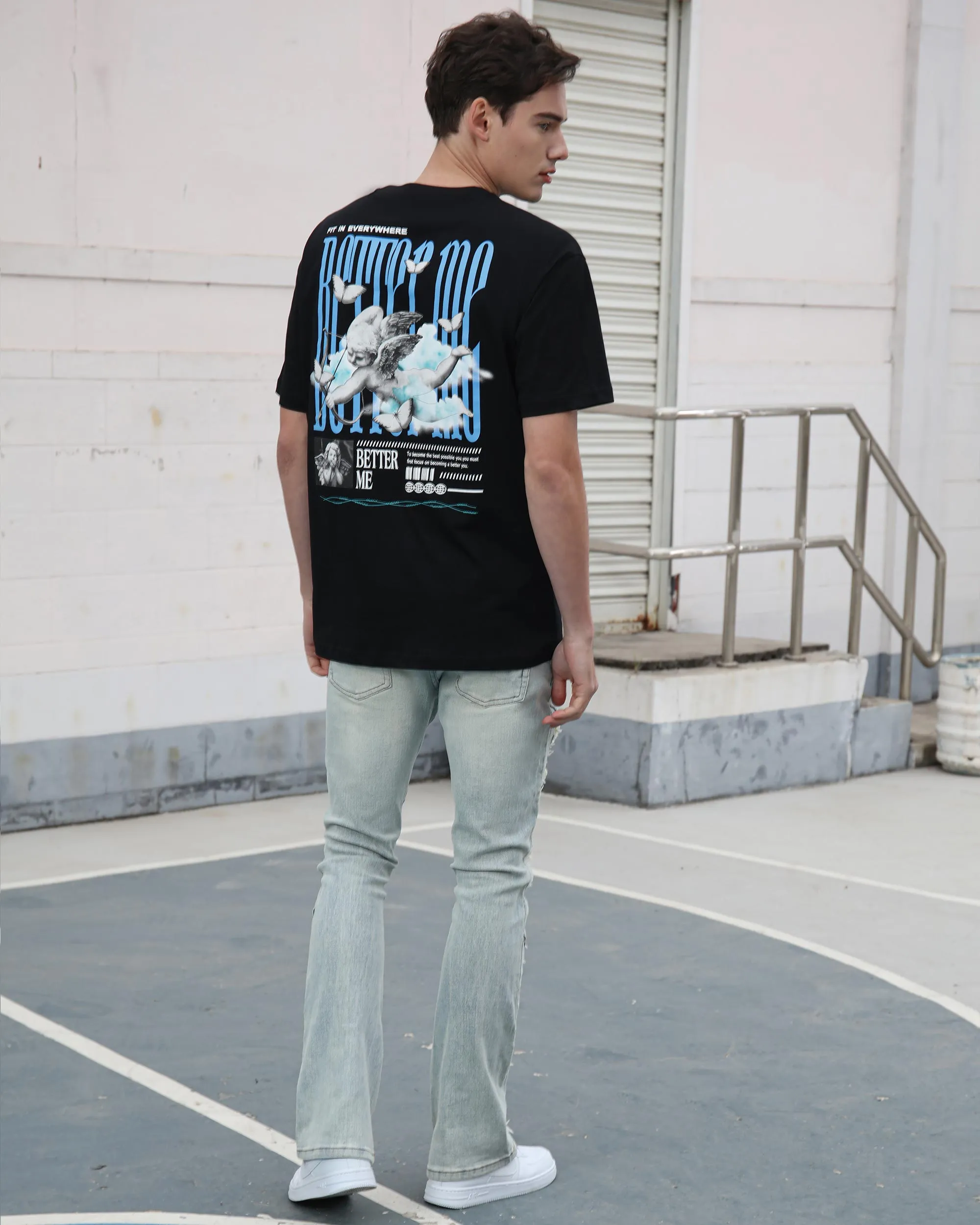 Distressed Flared Blue Jeans with Large Ripped