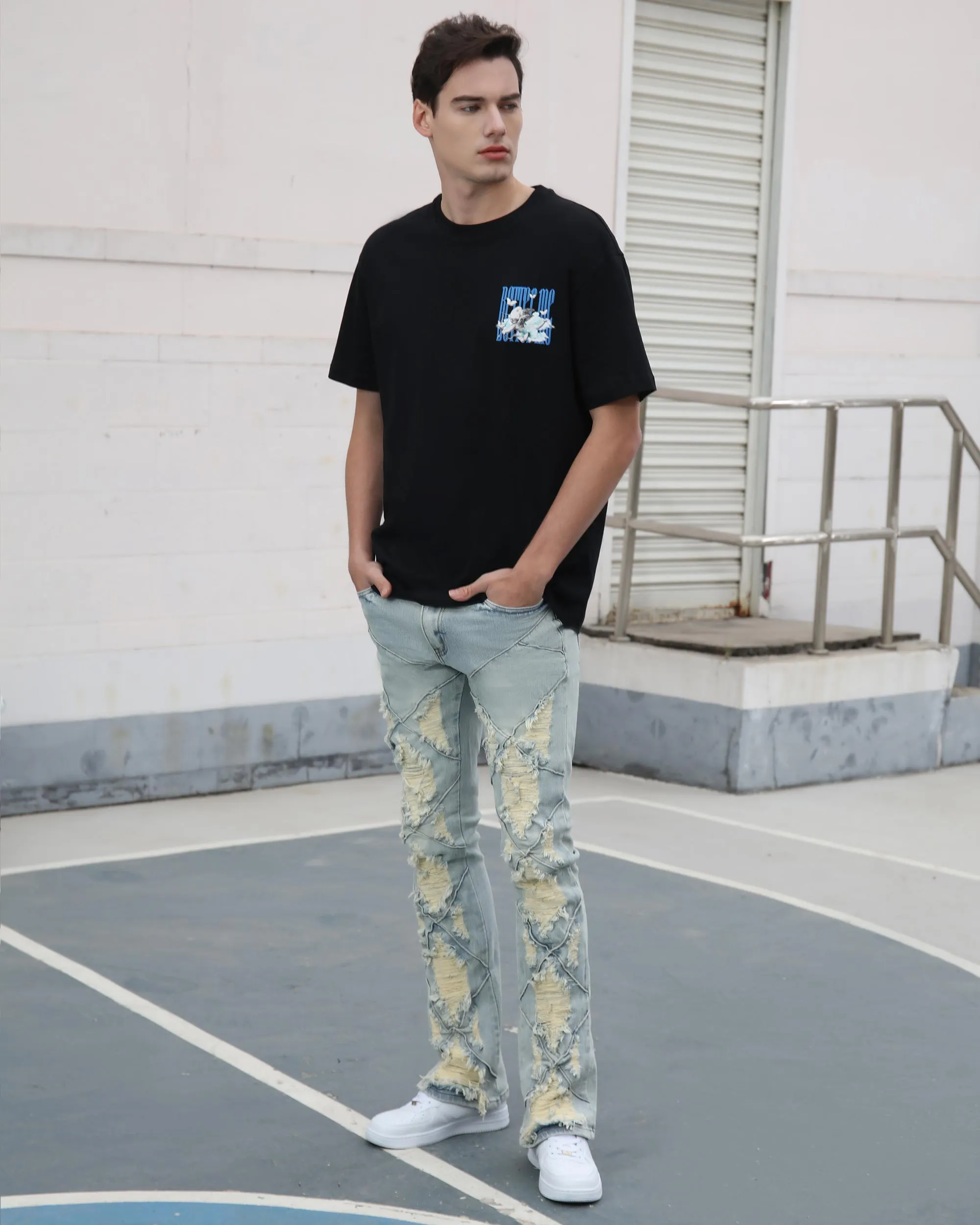 Distressed Flared Blue Jeans with Large Ripped