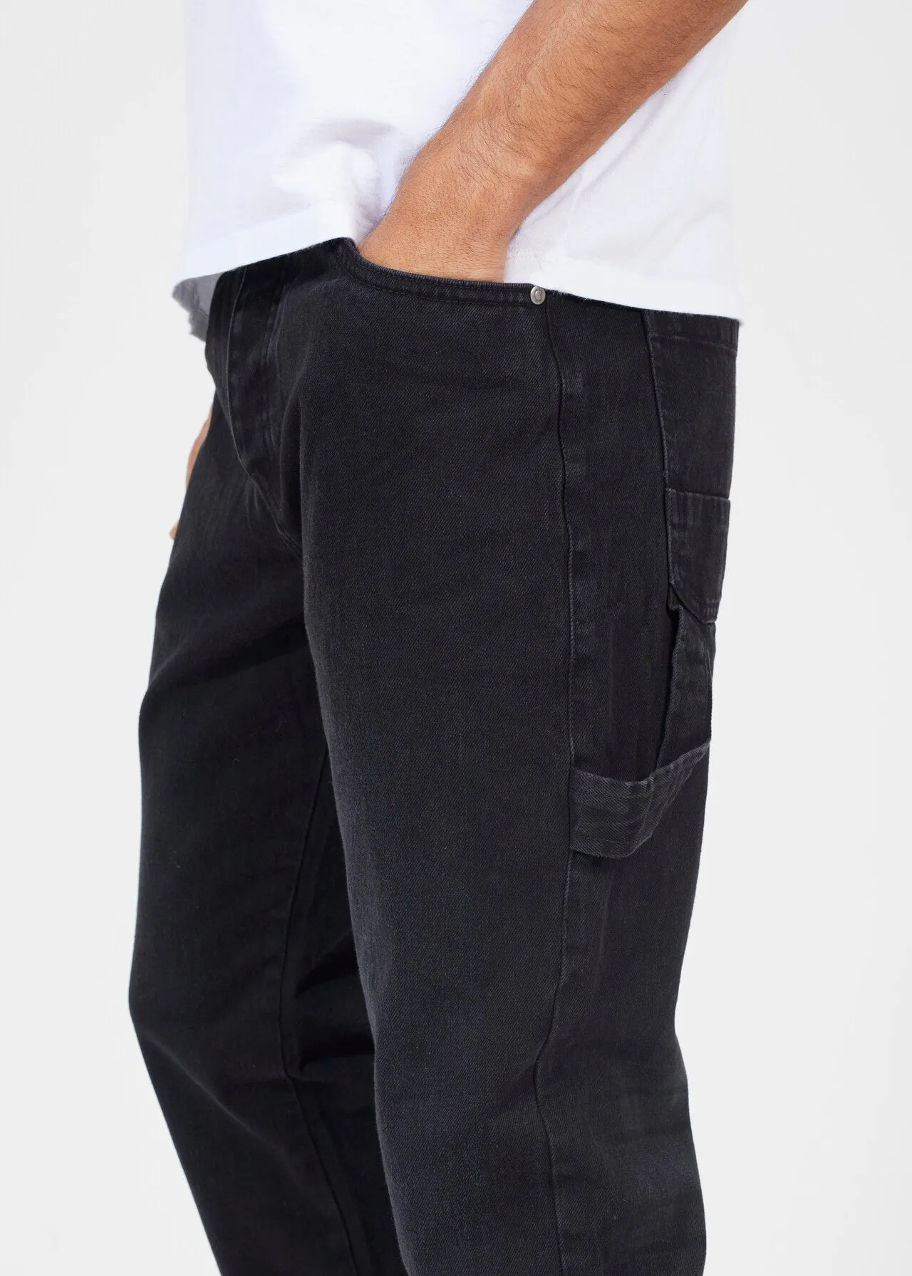 LOOSE FIT CARPENTER STYLE JEAN WITH HEM SPLIT DETAIL