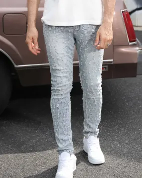 Slim Fit Light Wash Blue Ripped Jeans with Small Rips